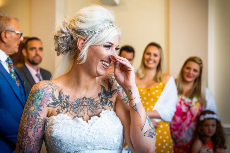 smiling bride during her wedding ceremony photographed at hull registry office