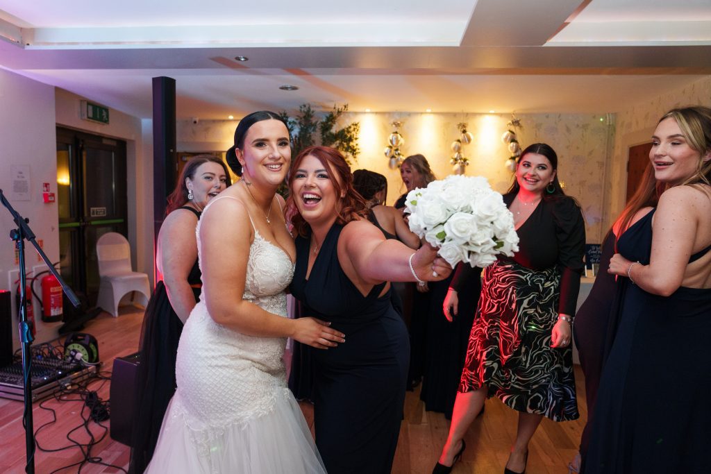bride and bridesmaid at lazaat hotel east yorkshire scaled