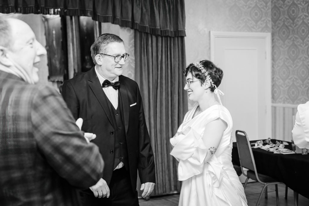 bride dancing with father at wedding reception at minerva masonic lodge scaled