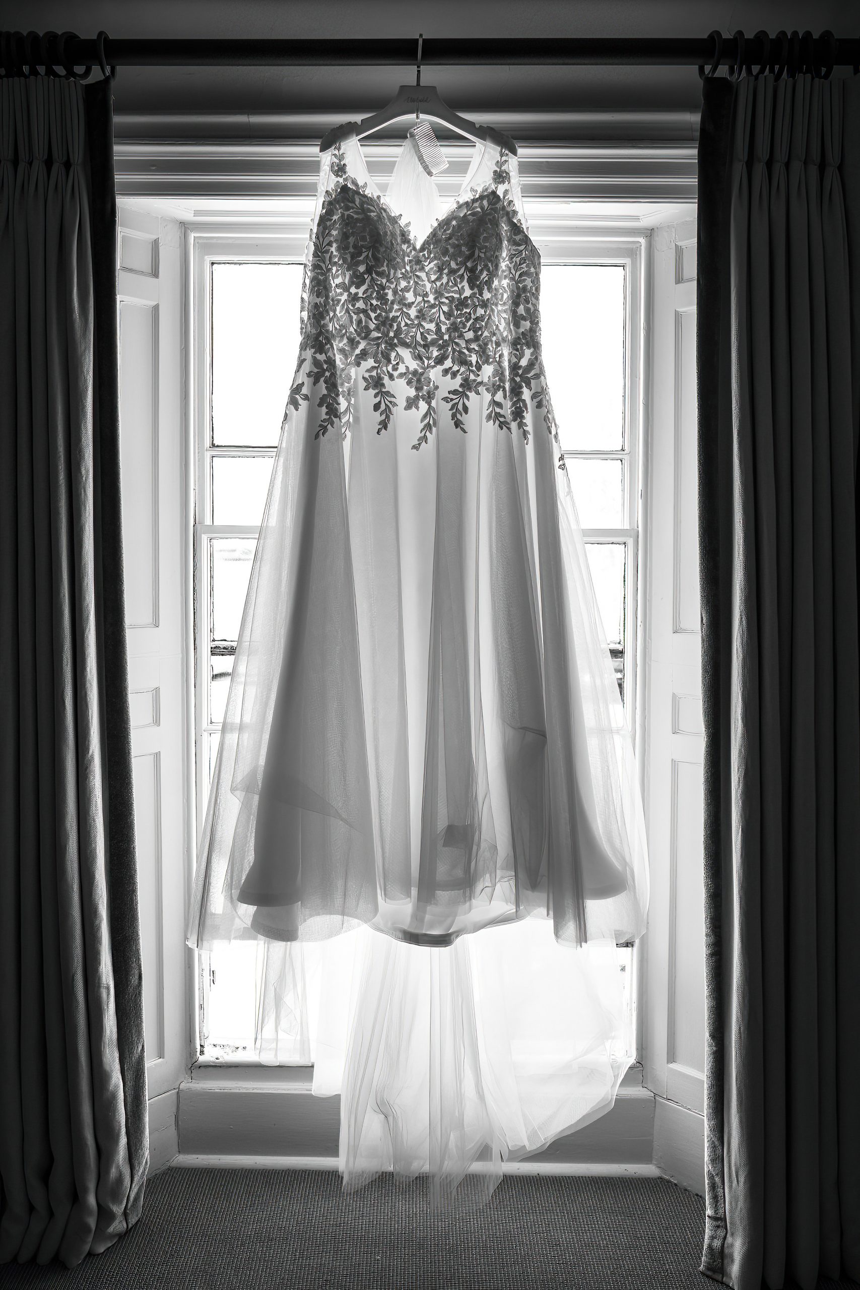 wedding-dress-hangng-at-tickton-grange-hotel