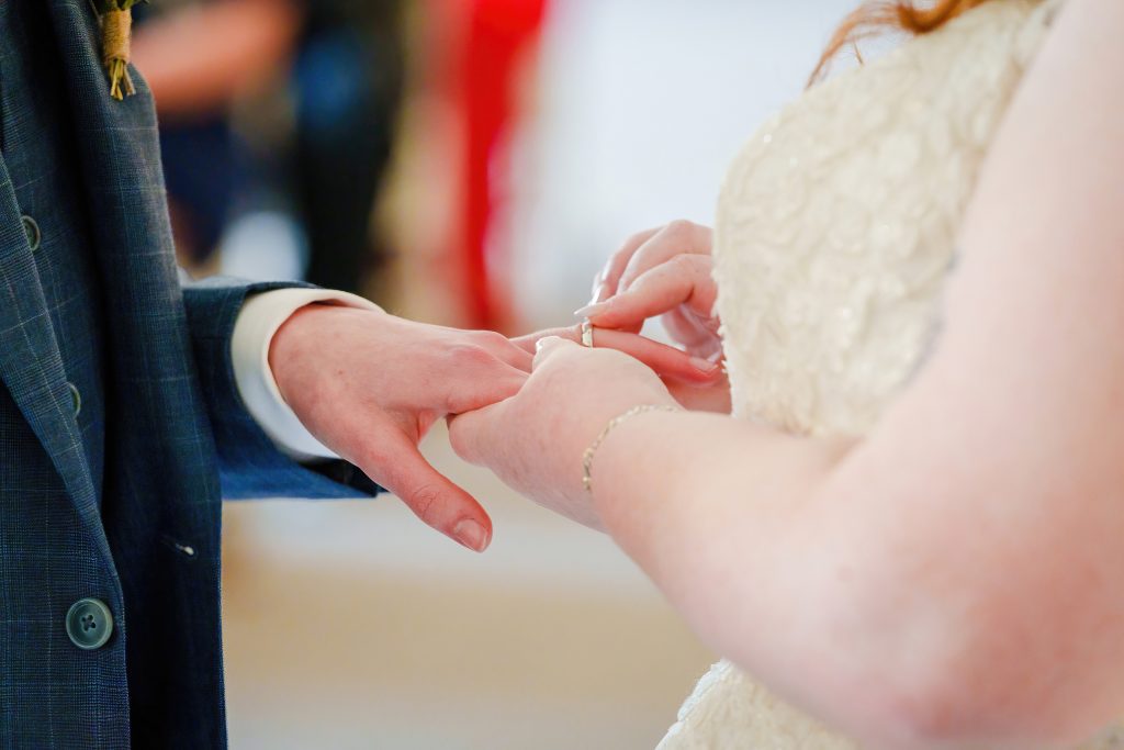 exchanging rings at a tickton grange wedding