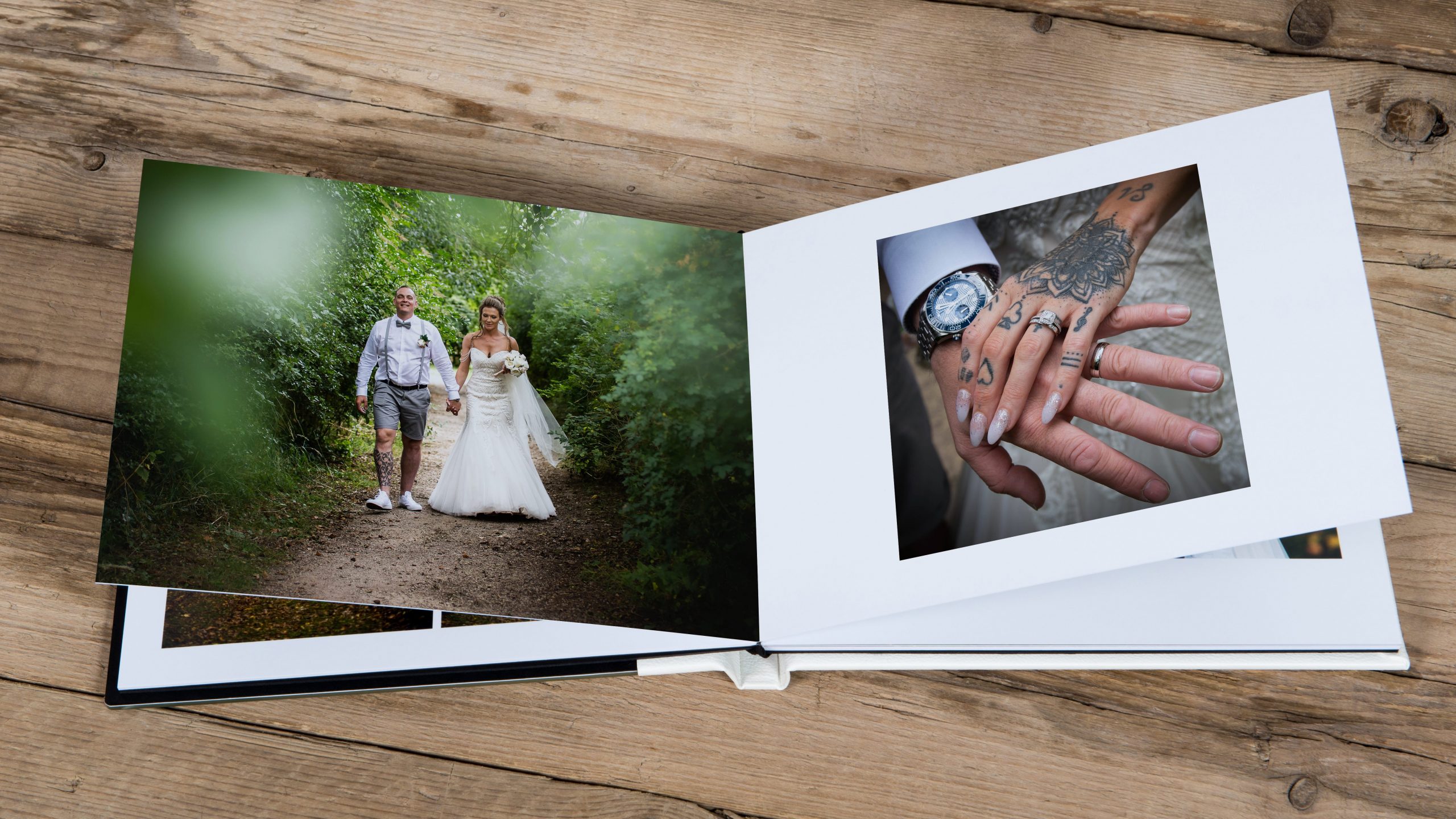 about kept photography - one of our wedding photography albums on wooden table